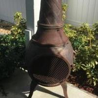 Cast Iron Ouutdoor Firebox with Tall chimney for sale in Jensen Beach FL by Garage Sale Showcase member Meliss, posted 10/20/2018