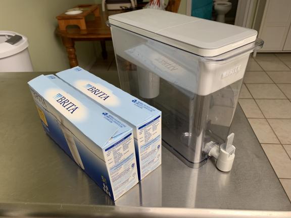 Brita 1 gallon water filter dispenser and 10 filters for sale in Vero Beach FL