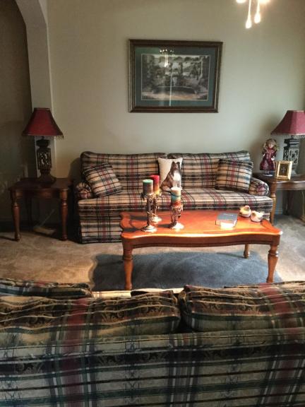 Couch,love seat,chair three tables and two lamps