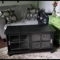 Sliding glass door black cabinet for sale in Greenfield IN by Garage Sale Showcase member KEN SMOAK, posted 06/08/2019