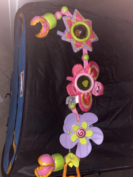 Pink car seat toy bar for sale in Franklin Lakes NJ