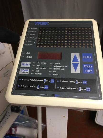 Programmable exercise bicycle