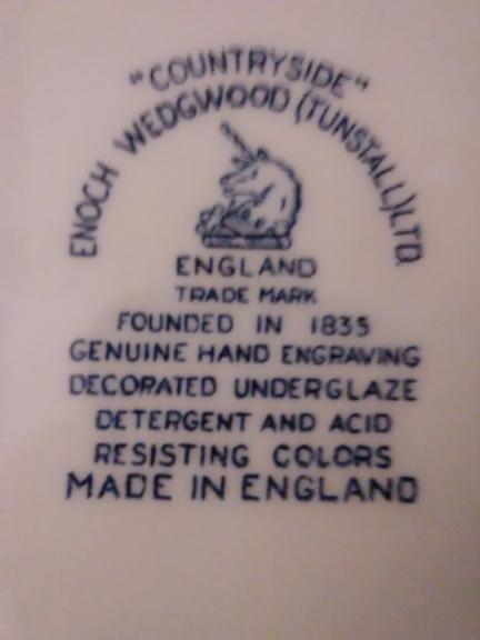 Two Wedgwood Dinner Plates