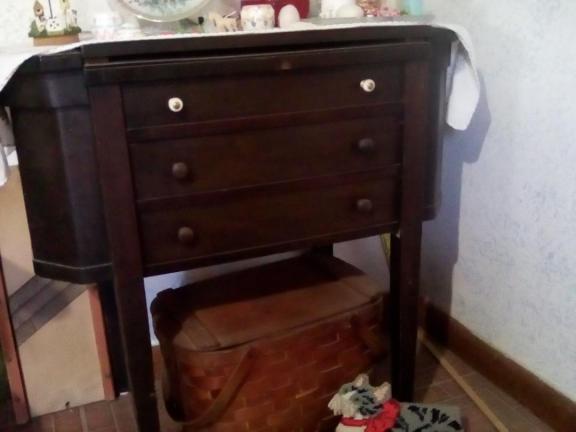 Antique sewing machine cabinet for sale in Mill Creek IN