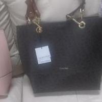 Calvin Klein Purse w/ wallet for sale in Upper Marlboro MD by Garage Sale Showcase member Jlau50, posted 03/21/2022