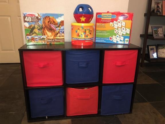 2 tier shelf with 6 bins and early learning stuff for sale in Katy TX