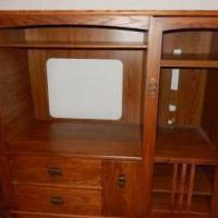 Entertainment Center - Medium Oak for sale in North Liberty IA by Garage Sale Showcase Member Jsknight007