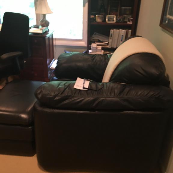 Overstuffed Black Leather Chair And Matching Ottoman